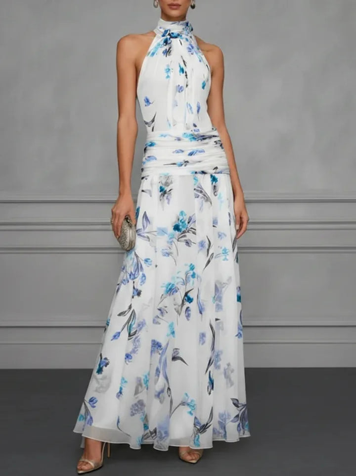 Stylish women's floral halter maxi dress, perfect as a wedding guest outfit or for elegant party wear.