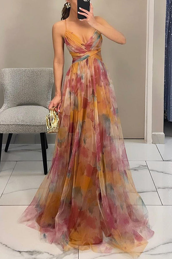 Chic women's elegant floral maxi dress, flowy and draped, suitable for wedding guests, special occasions & vacations.