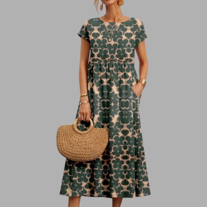 Chic women's elegant floral midi dress, designed for special occasions & event wear. A stylish party dress.