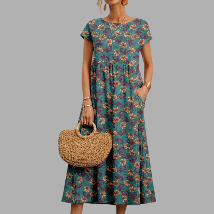 Vibrant floral midi dress for women, an elegant choice for summer parties, events & semi-formal occasions.