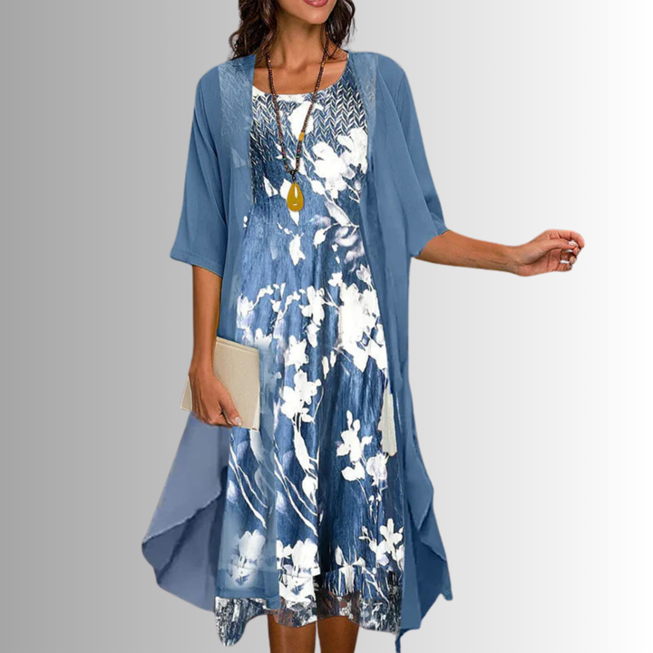 Stylish two-piece women's set: floral midi dress & sheer cardigan. Ideal for elegant occasion wear.