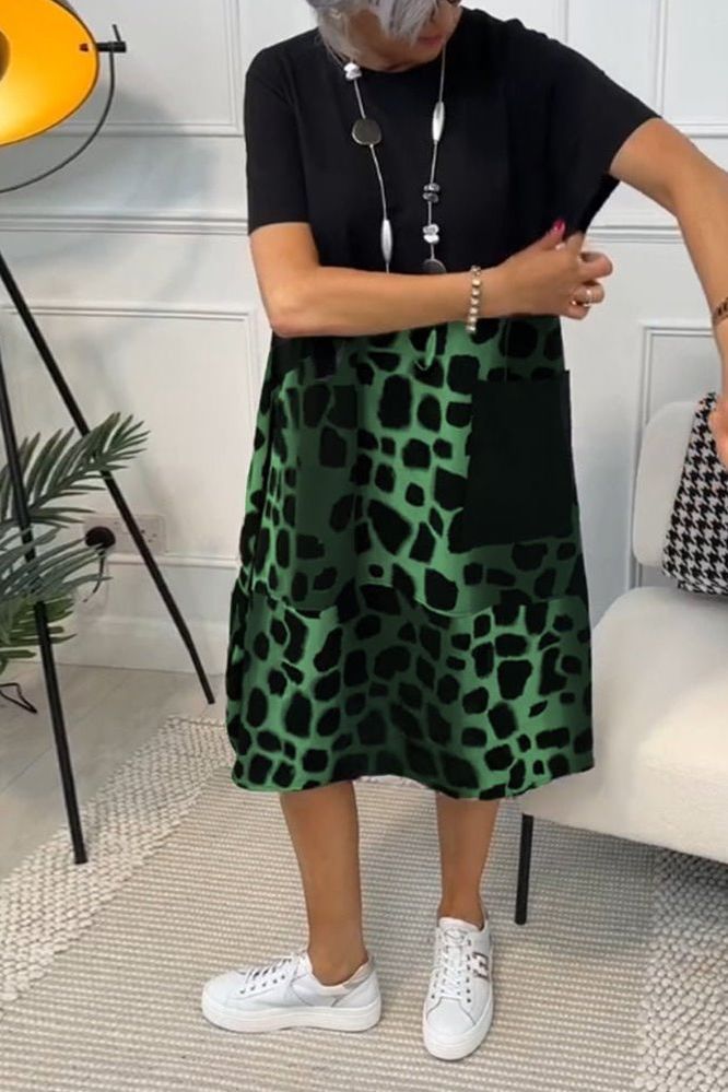 Beautiful floral midi dress for women, an elegant and casual option with a flattering cinched waist.