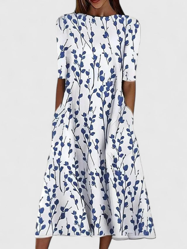 Elegant women's floral midi dress with round neck, perfect for summer vacations or comfortable day wear.