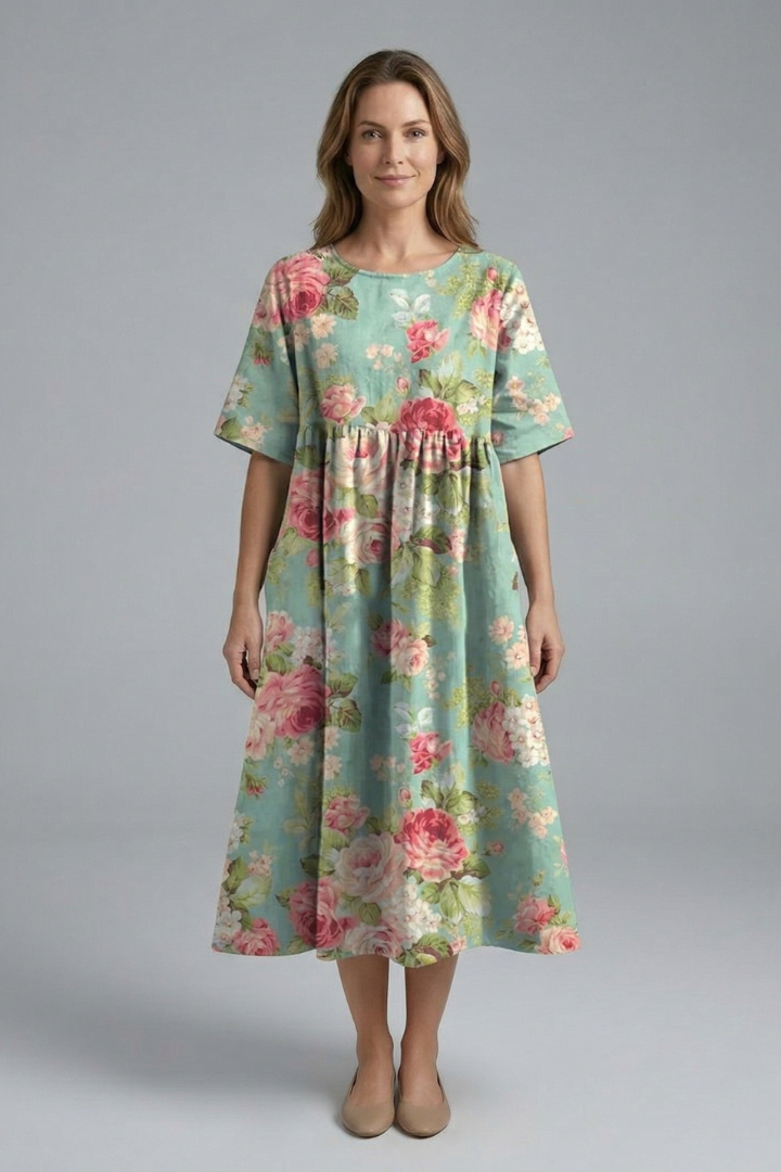Women's spring/summer floral midi dress, round neck, short sleeve, flared skirt for casual elegance.