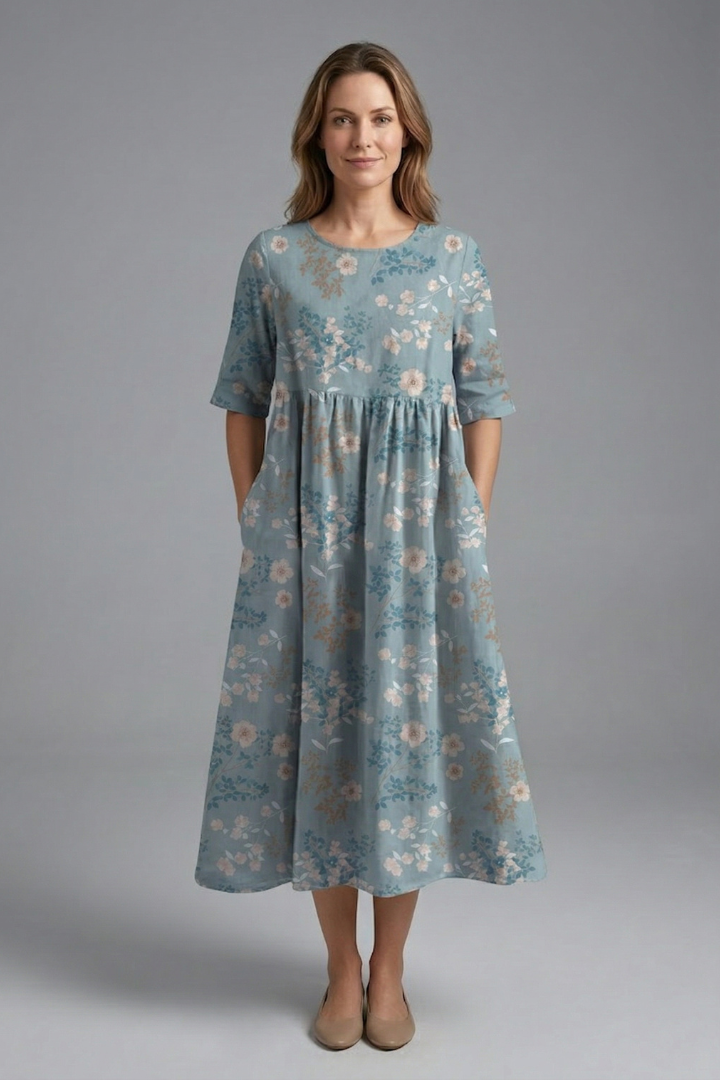 Chic women's floral midi dress with elegant round neck, short sleeves & a gracefully flared skirt.