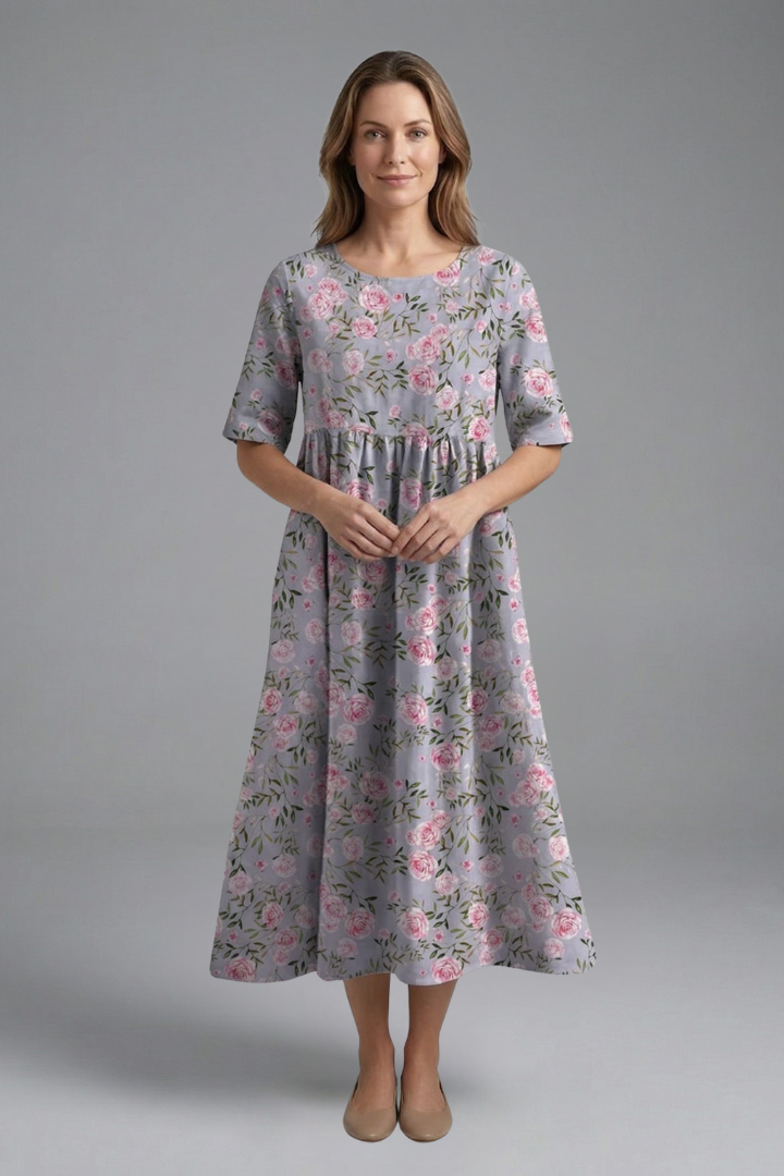 Vibrant floral print women's midi dress, round neck, short sleeve, flared for spring & summer style.