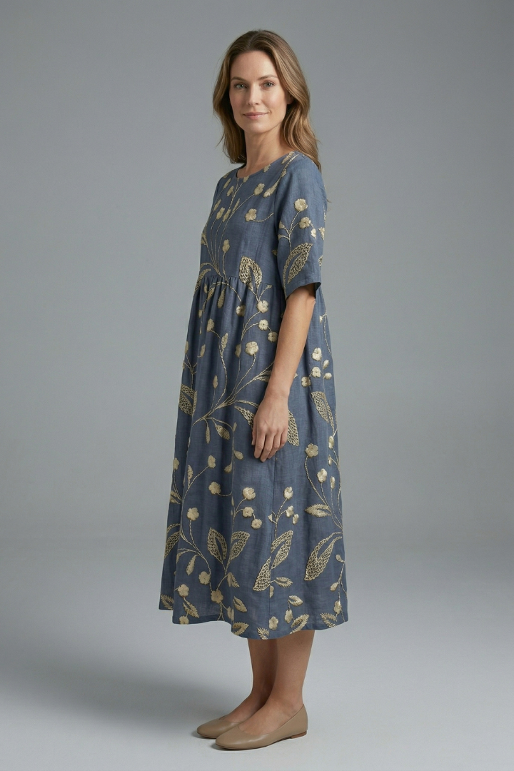 Women's short sleeve floral midi dress, round neck, flared skirt, perfect for warm weather fashion.