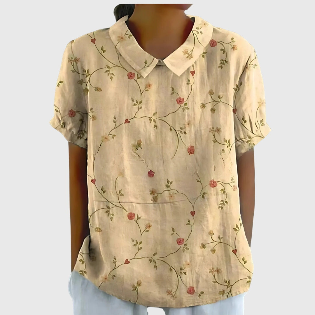 Comfortable loose fit floral blouse for women, ideal as a versatile summer top.