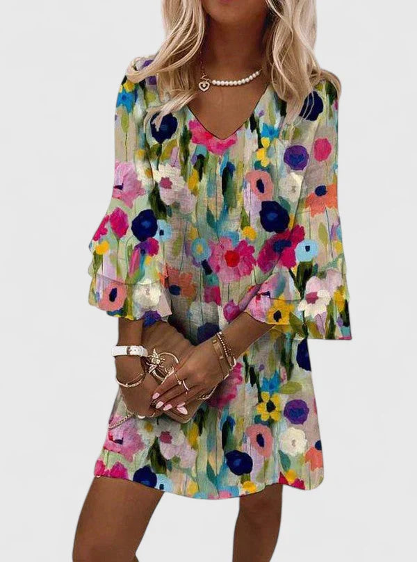 Elegant women's floral print mini dress with V-neck, perfect for spring cocktail parties & special occasions.