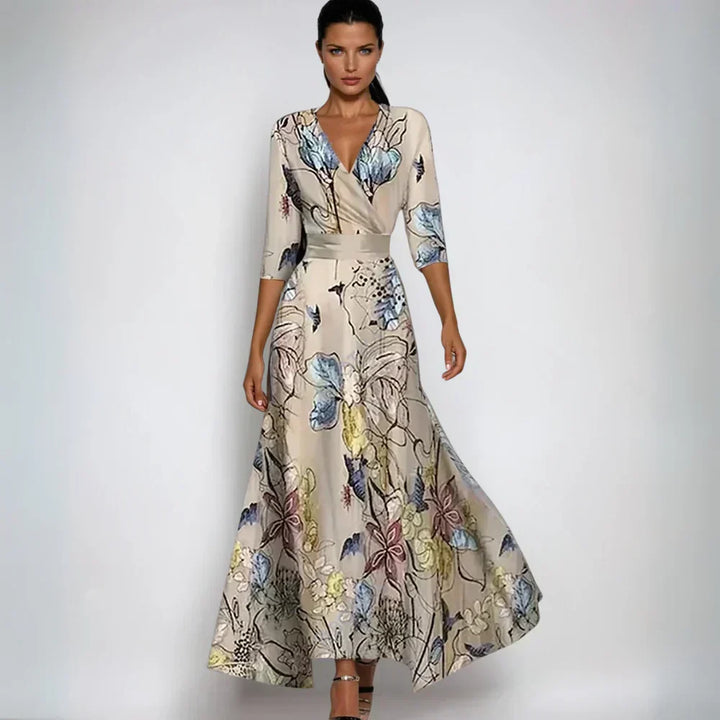 Chic women's floral maxi wrap dress with V-neck & 3/4 sleeves, ideal for wedding guests & elegant evening wear.