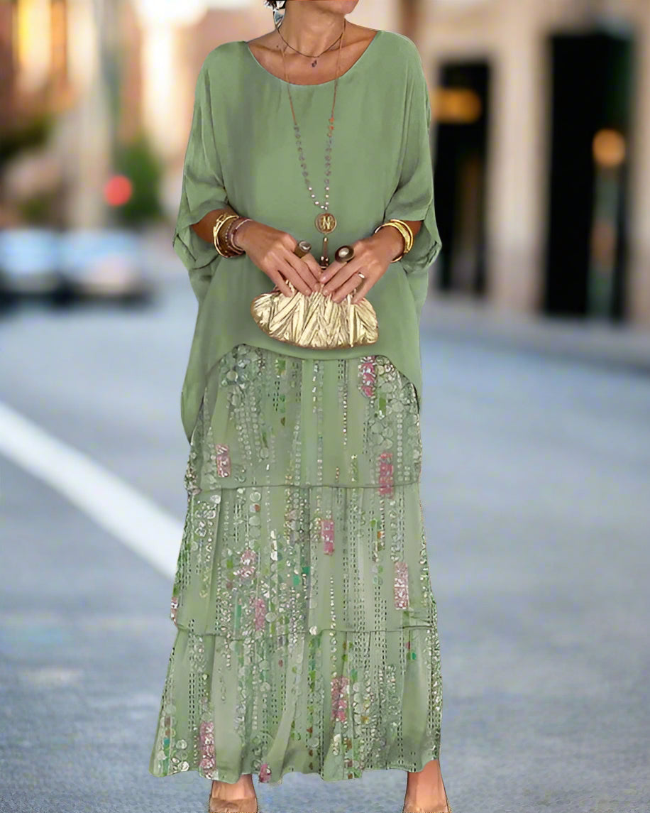 Beautiful women's floral sequin maxi dress. Features tiered boho design, great for elegant summer events.