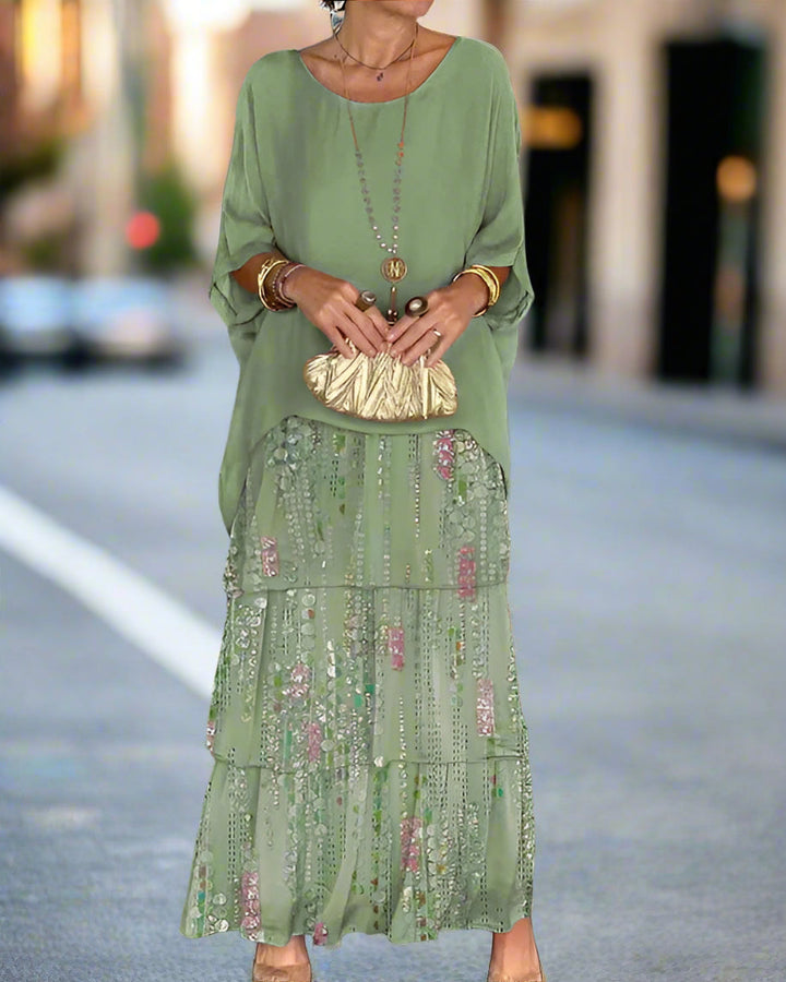 Beautiful women's floral sequin maxi dress. Features tiered boho design, great for elegant summer events.