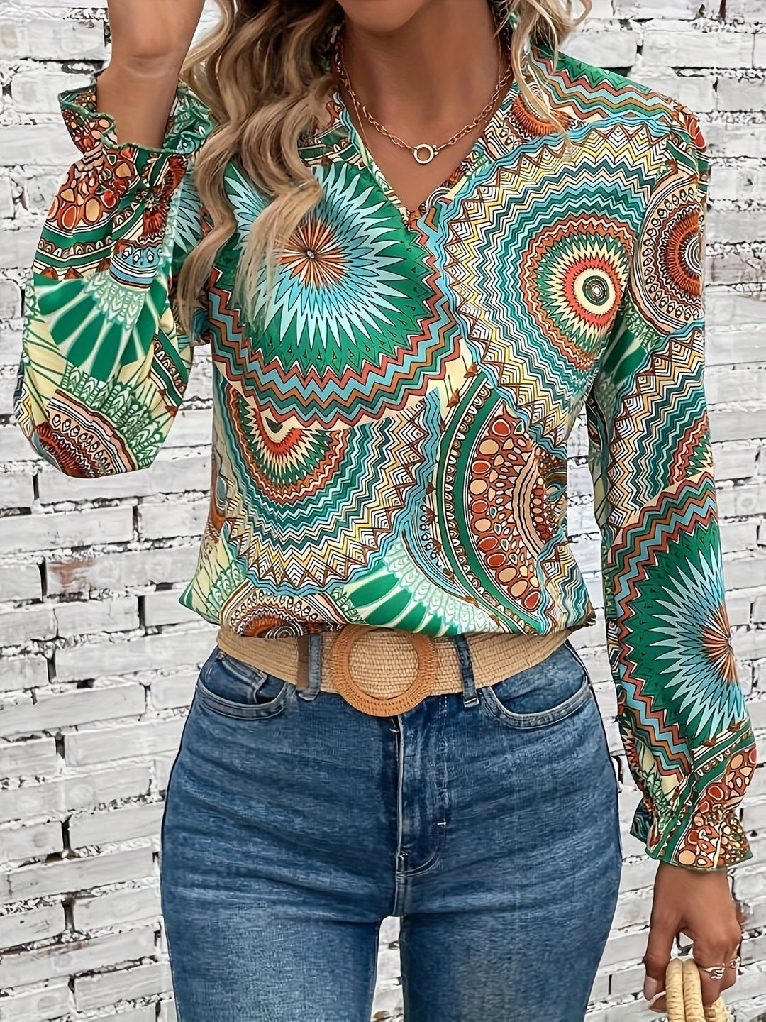 Elegant women's floral V-neck blouse, perfect for stylish spring and fall outfits.