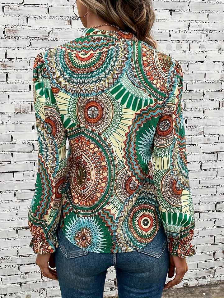Feminine V-neck blouse for women, featuring a vibrant floral pattern for spring and fall fashion.