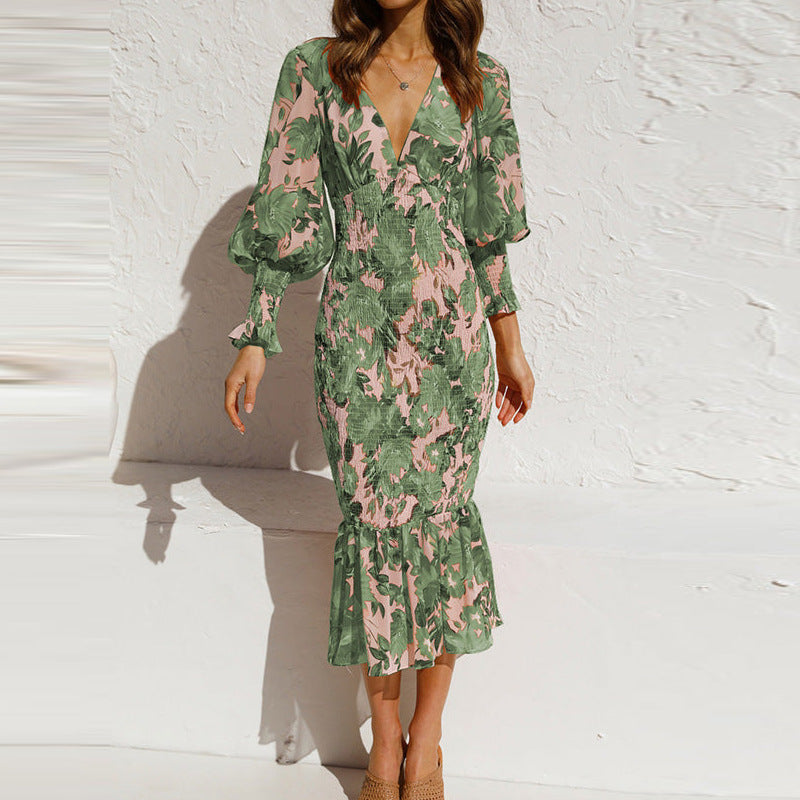 Chic women's floral pattern V-neck midi dress, bodycon fit with elegant bishop sleeves & ruffle details.
