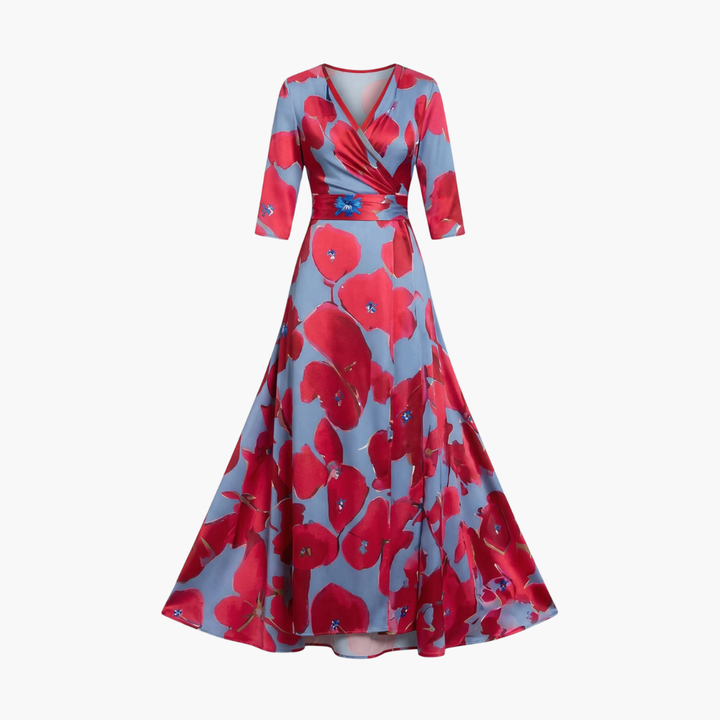 Women's long floral V-neck maxi dress on display. Elegant summer evening wear.