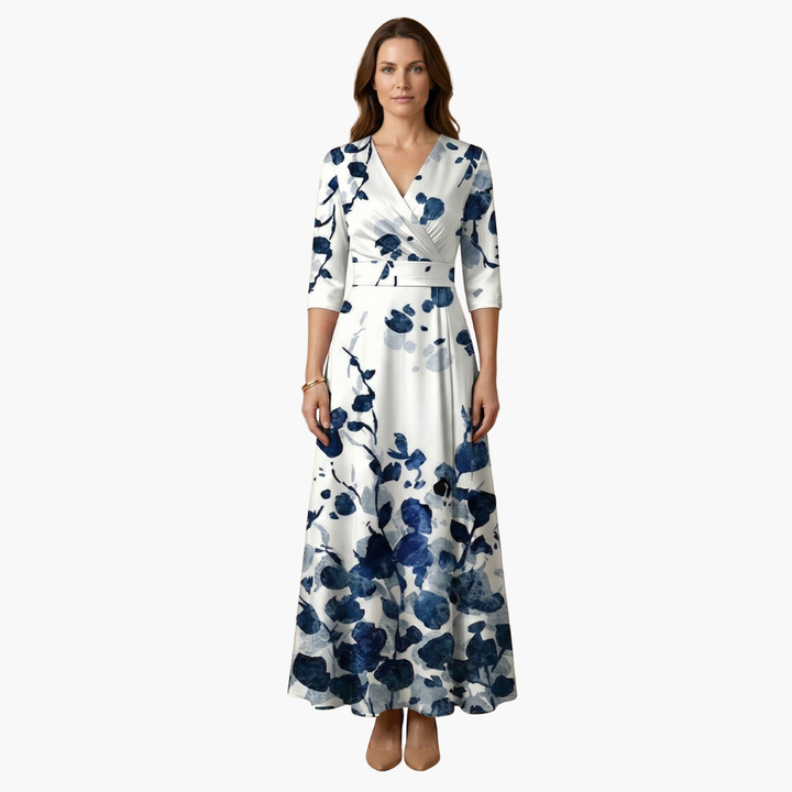 Lightweight, flowing fabric of an elegant floral V-neck maxi dress. Perfect comfort for summer.