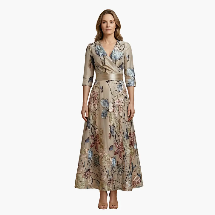 Chic women's elegant floral V-neck maxi dress, styled for a perfect summer outdoor look.