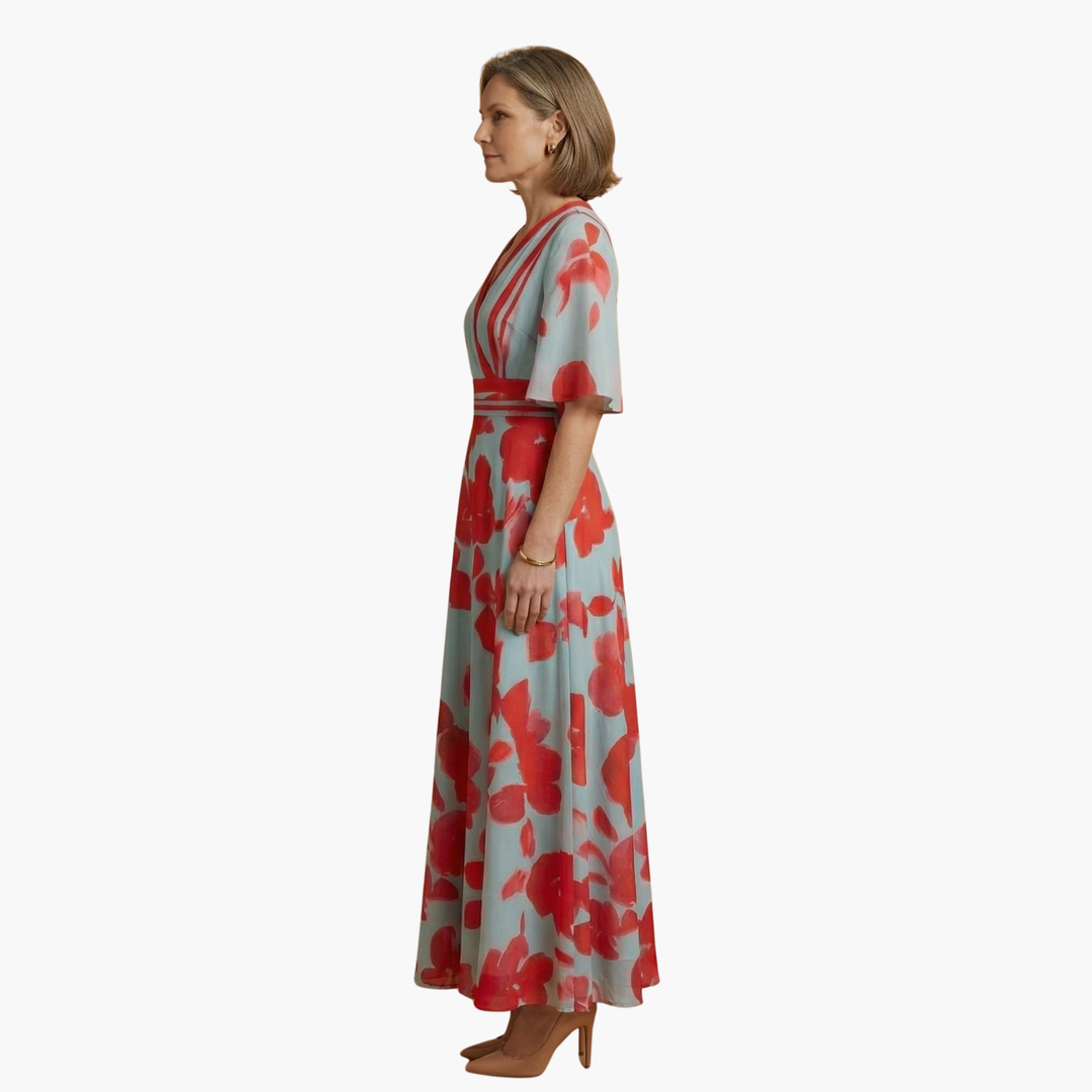 Chic women's long floral maxi dress with a V-neck, ideal for elegant summer gatherings.