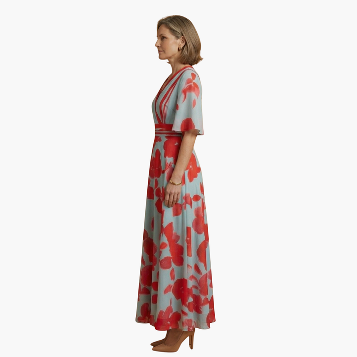 Chic women's long floral maxi dress with a V-neck, ideal for elegant summer gatherings.