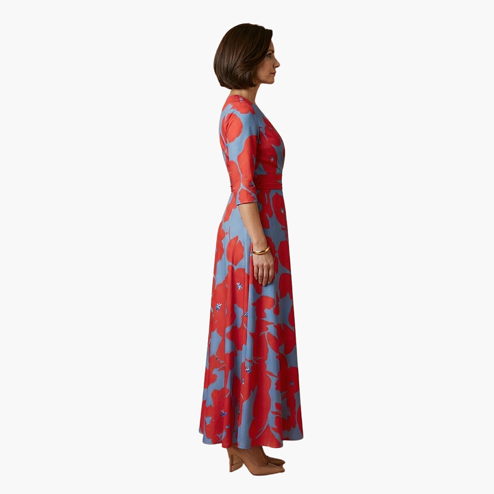Sleeveless elegant floral V-neck maxi dress, showcasing its flowing summer silhouette.