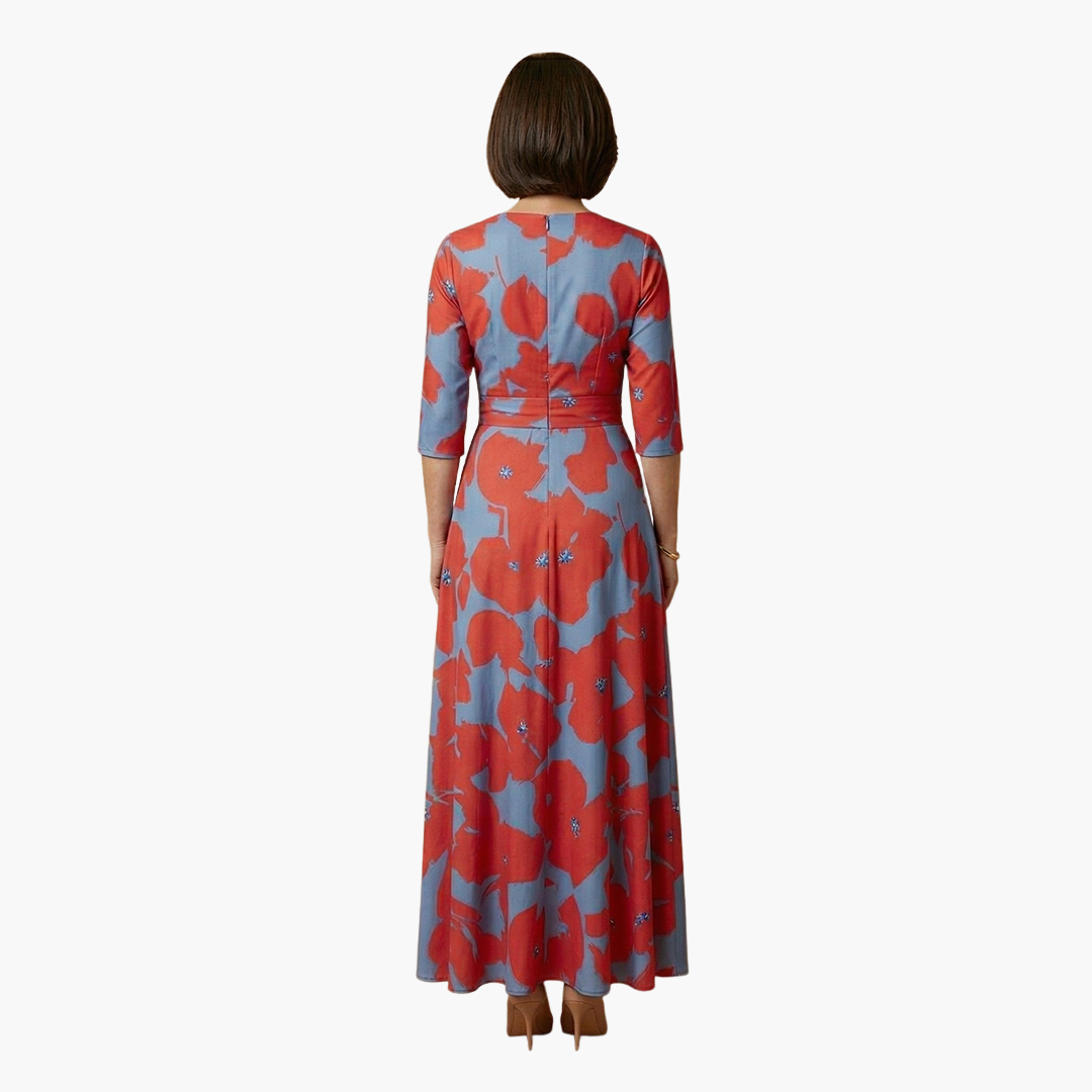 Intricate floral print on an elegant V-neck maxi dress for women. Chic and comfortable summer wear.