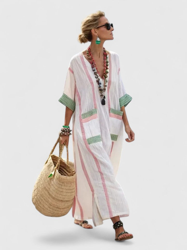 Elegant women's flowing maxi dress, perfect for sophisticated occasions & versatile styling.