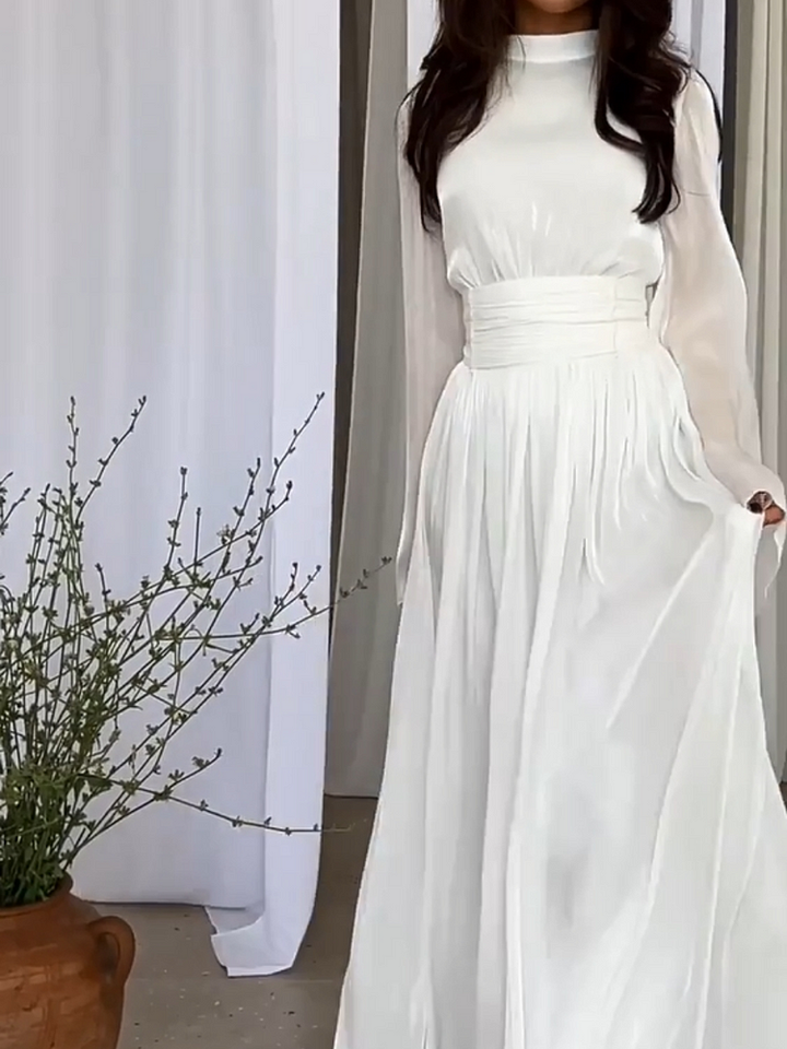 Playful women's flowing maxi dress with a versatile design, ideal for summer fashion, vacation, or casual elegance.