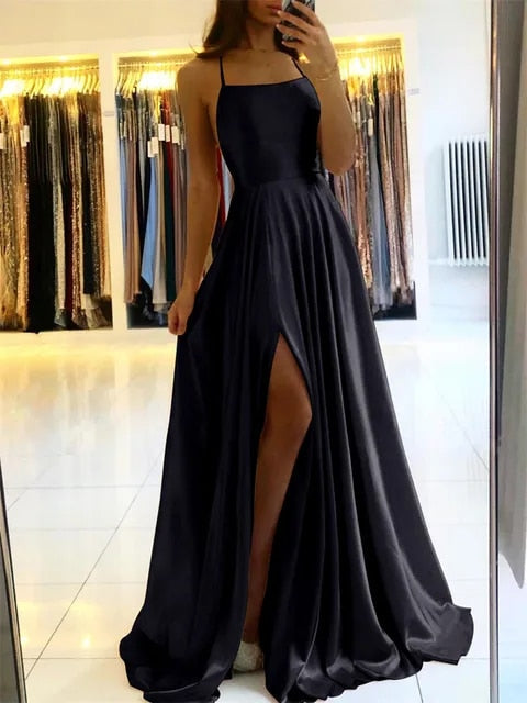 Soft & versatile women's flowing maxi dress with a flattering side slit. A comfortable choice for any occasion.