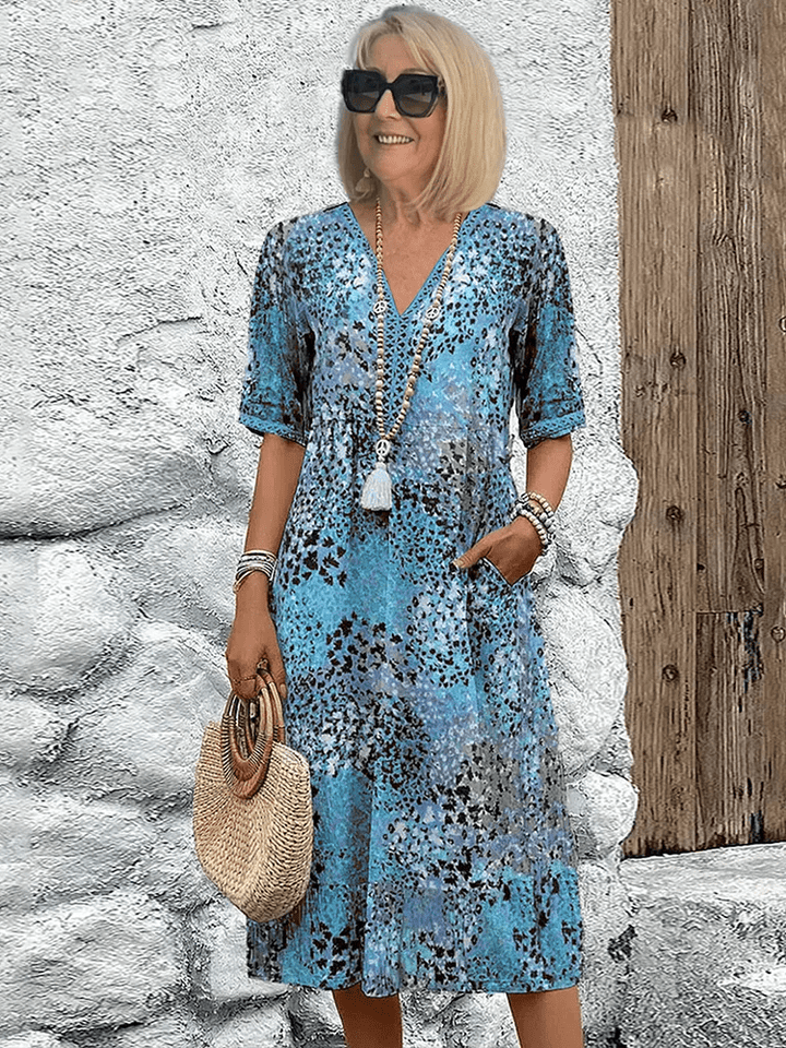 Casual women's 'Ocean Breeze' summer dress, flowing fabric, perfect day dress or beach cover-up.