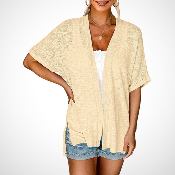 Elegant women's flowing open front short sleeve cardigan in apricot, perfect lightweight summer top for a layered look.