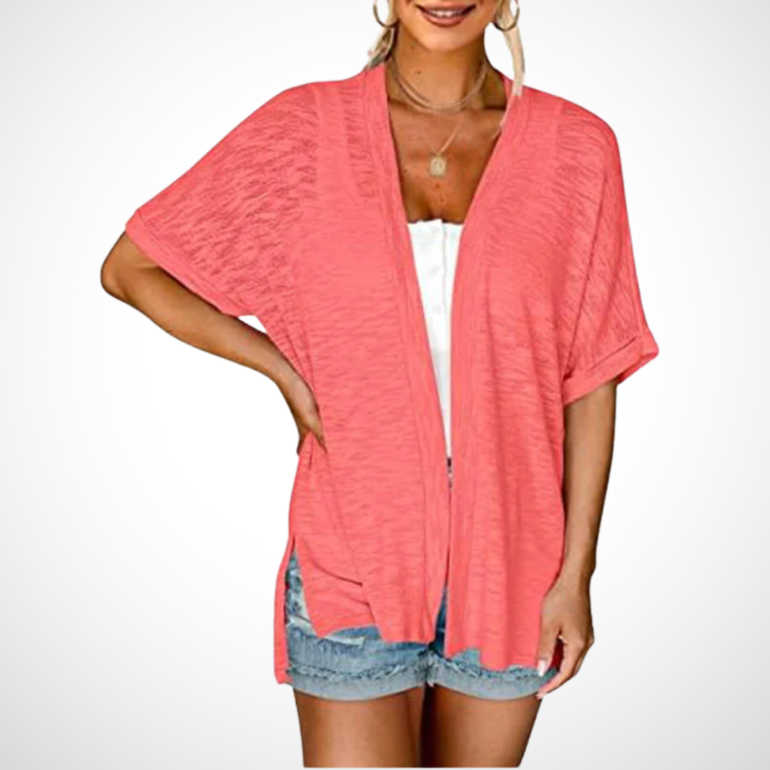 Comfortable black flowing open front short sleeve cardigan for women, an elegant lightweight summer top for casual style.