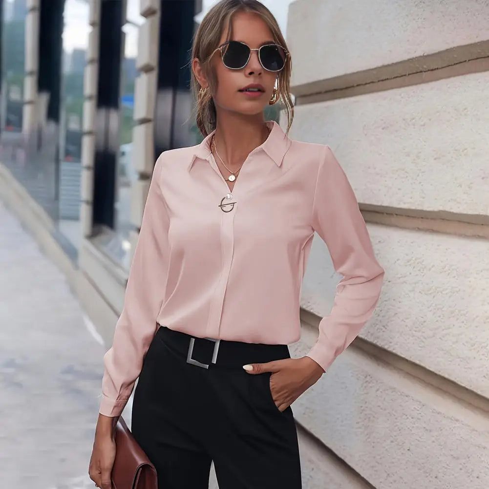 Sophisticated women's chiffon blouse with flowy long sleeves & elegant collar, ideal for professional settings.