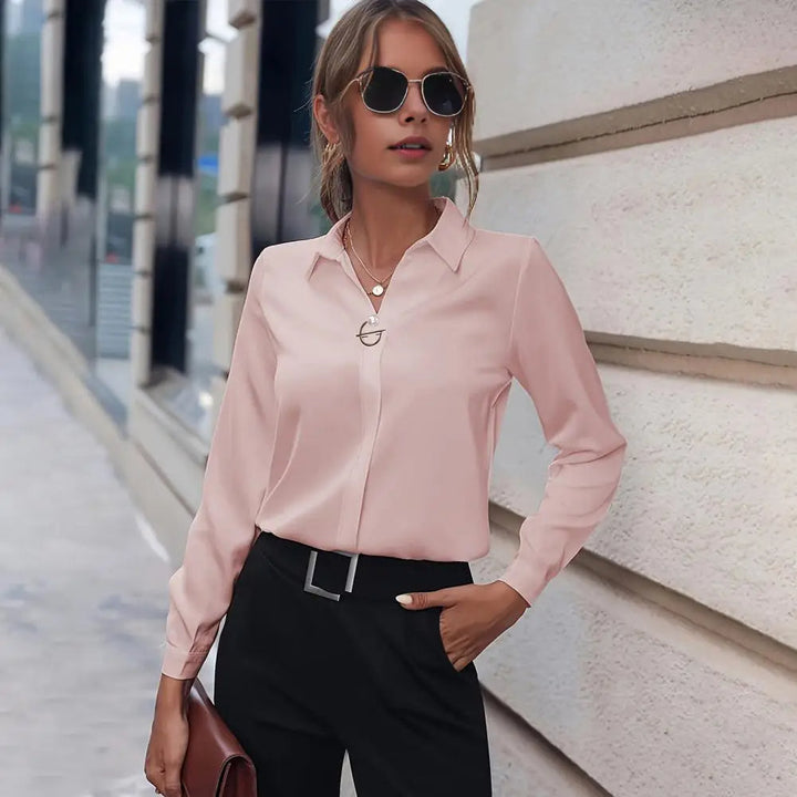 Sophisticated women's chiffon blouse with flowy long sleeves & elegant collar, ideal for professional settings.