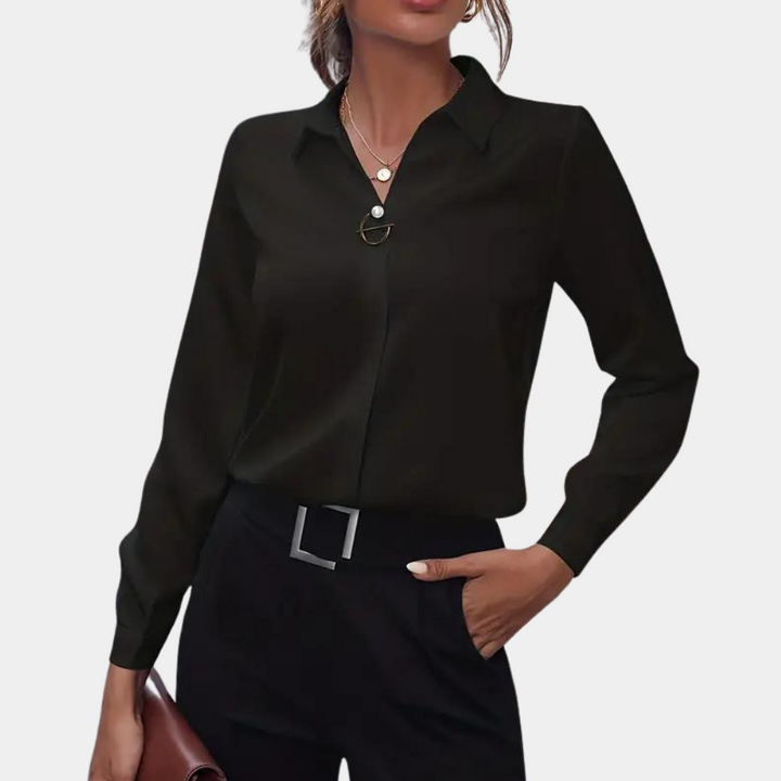 Feminine flowy long sleeve chiffon blouse for women, an elegant and comfortable top for sophisticated style.