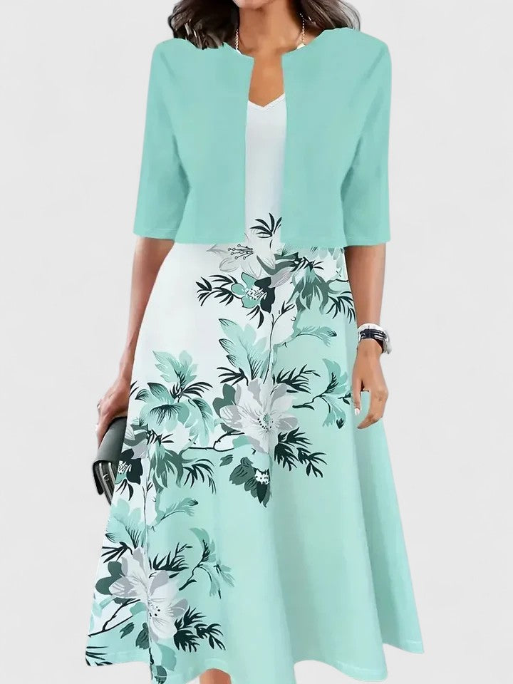 Elegant women's midi dress featuring a flowy design, perfect for chic versatile spring/summer occasions.