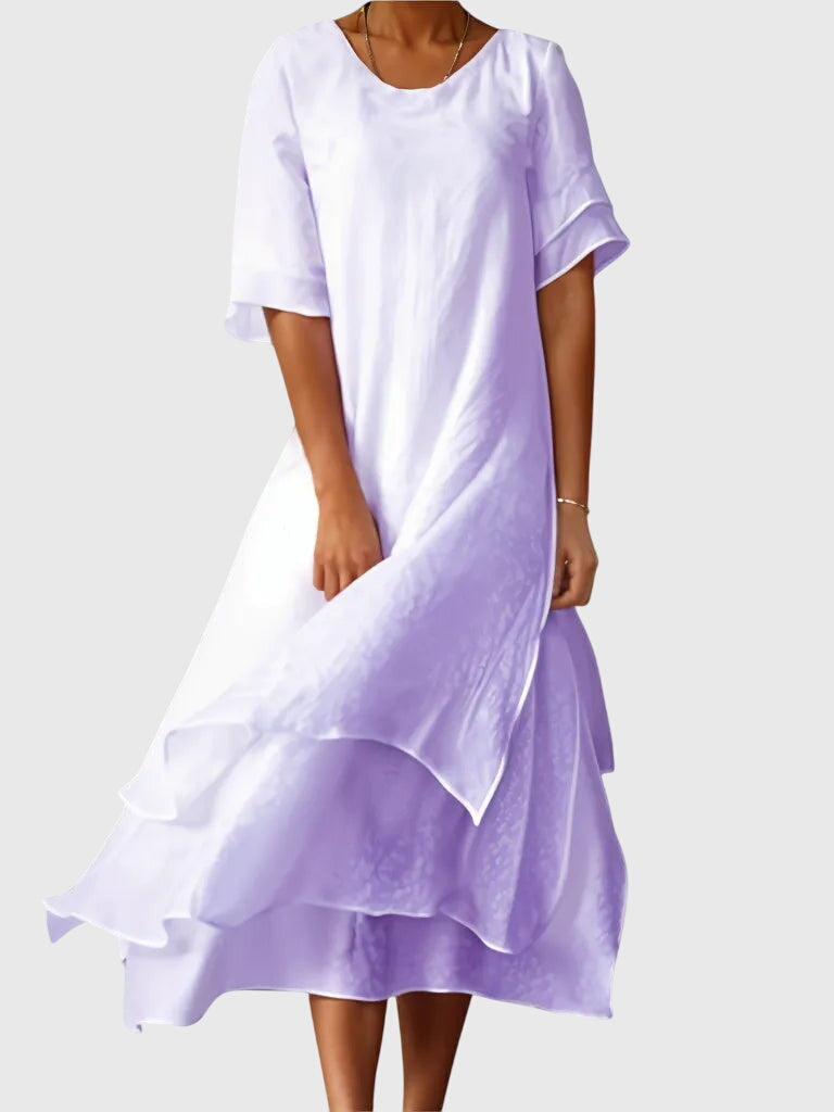 Day-to-night women's midi dress. Effortlessly elegant & flowy for versatile summer style. Comfortable, chic fashion wear.
