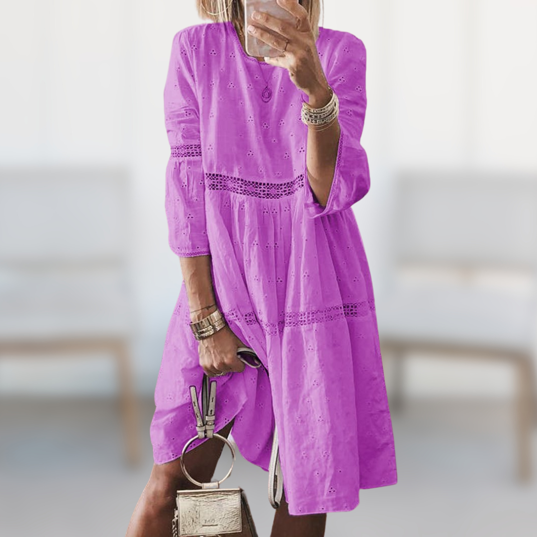 Casual women's summer day dress with a comfortable round neck, ideal for effortless everyday elegance.