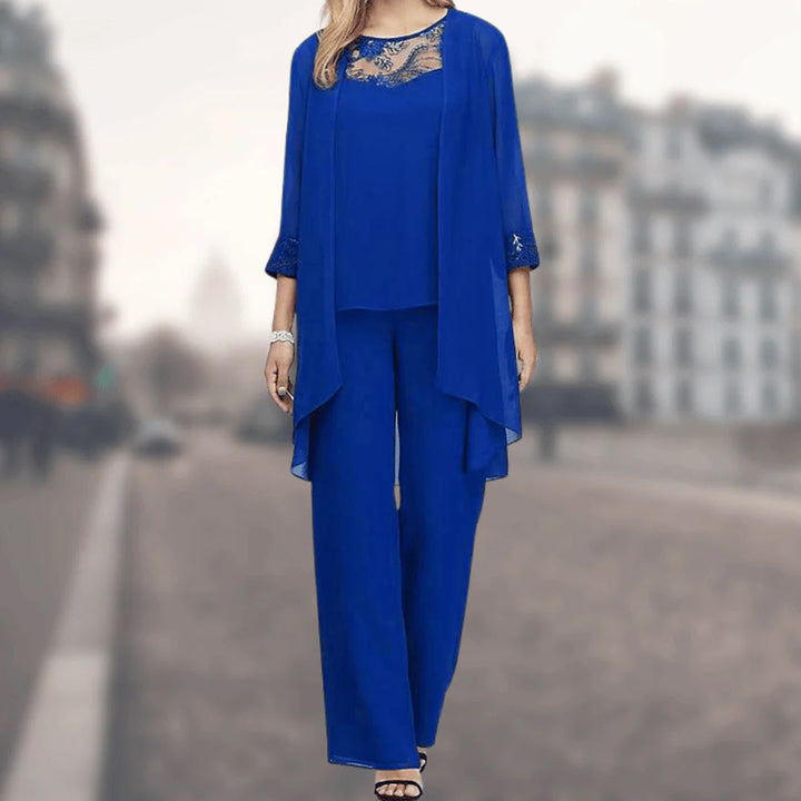 Women's elegant flowy 3-piece outfit set. Includes top, wide-leg pants, and jacket with delicate lace trim.