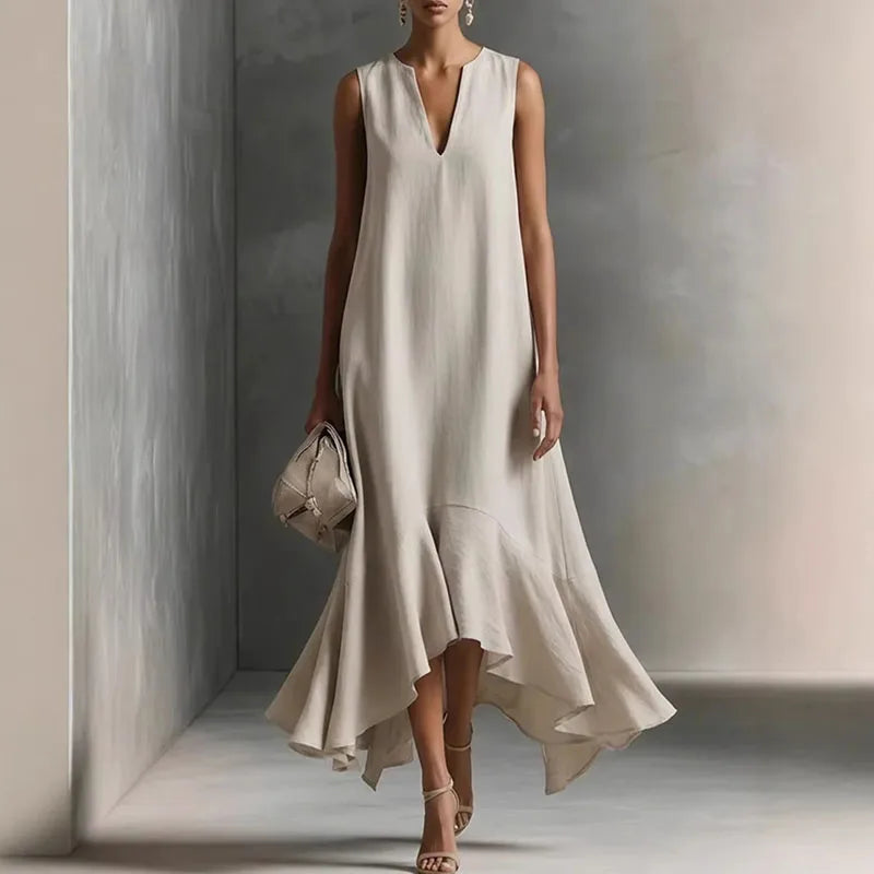 Elegant women's flowy V-neck sundress with a stylish ruffle hem. Perfect for summer casual wear or beach.