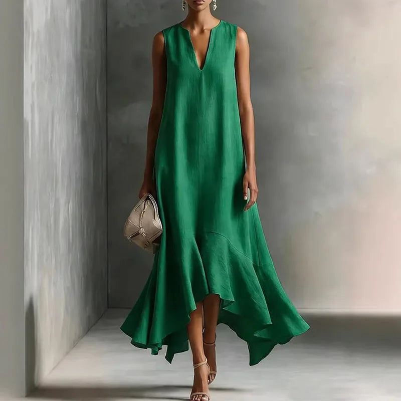 Women's V-neck sundress featuring a graceful flowy silhouette & chic ruffle hem. Casual yet elegant summer dress.