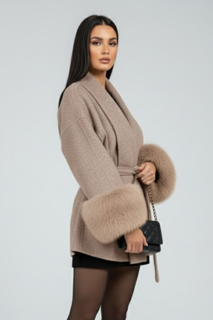 Long women's trench coat style, full-length with a chic waist tie. Elegant winter fashion for versatile layering.