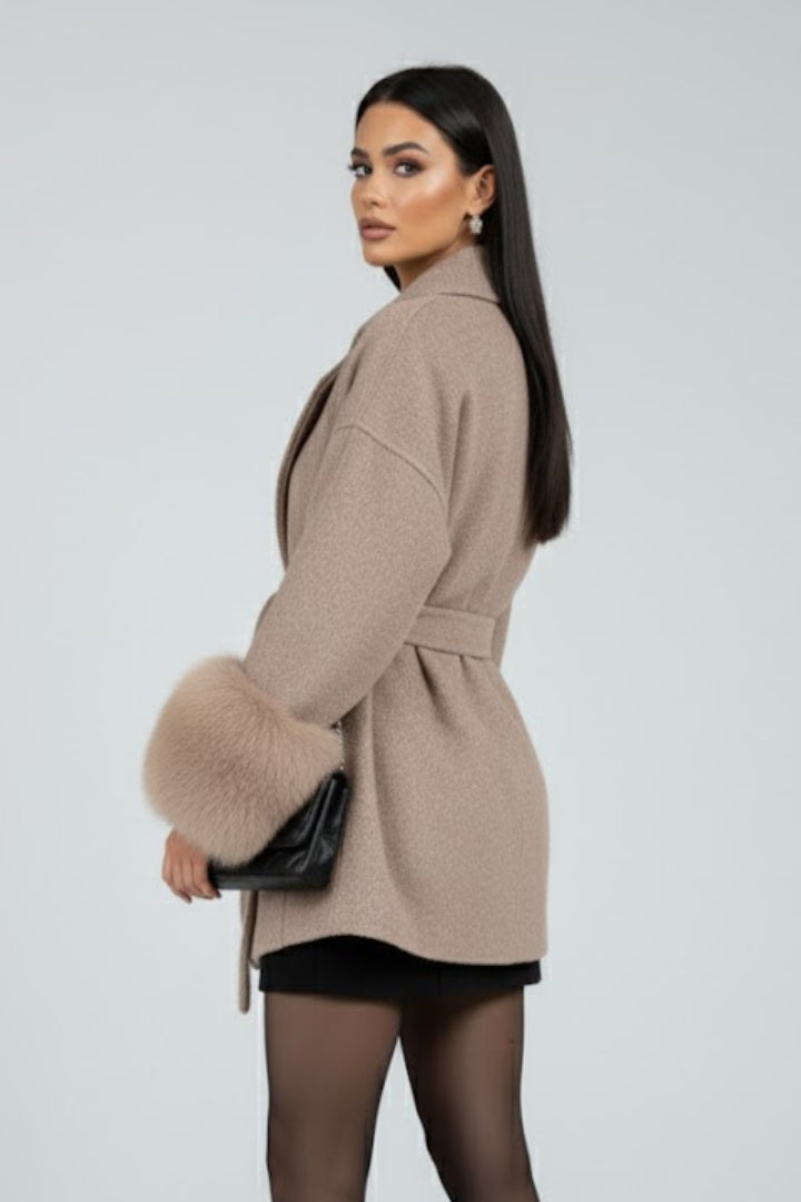 Women's full-length elegant winter coat. Chic belted outerwear with waist tie, offering versatile style and warmth.