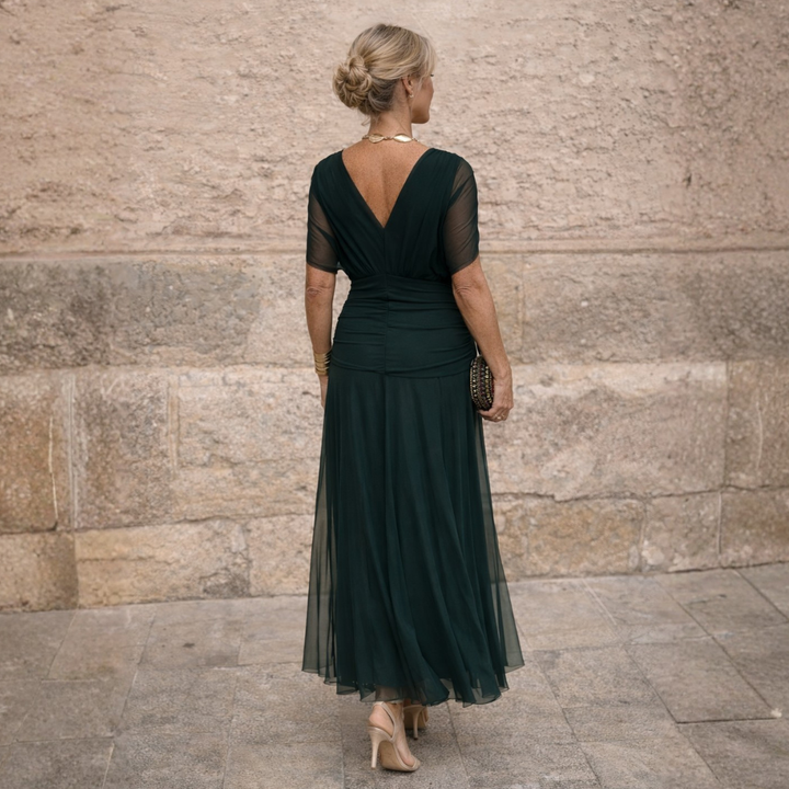 Elegant women's midi dress: V-neck, gathered bodice, flutter sleeves. Ideal for formal wear.