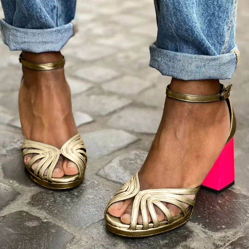 Elegant women's gold open toe sandals with a comfortable block heel & adjustable ankle strap, perfect for classic chic style.
