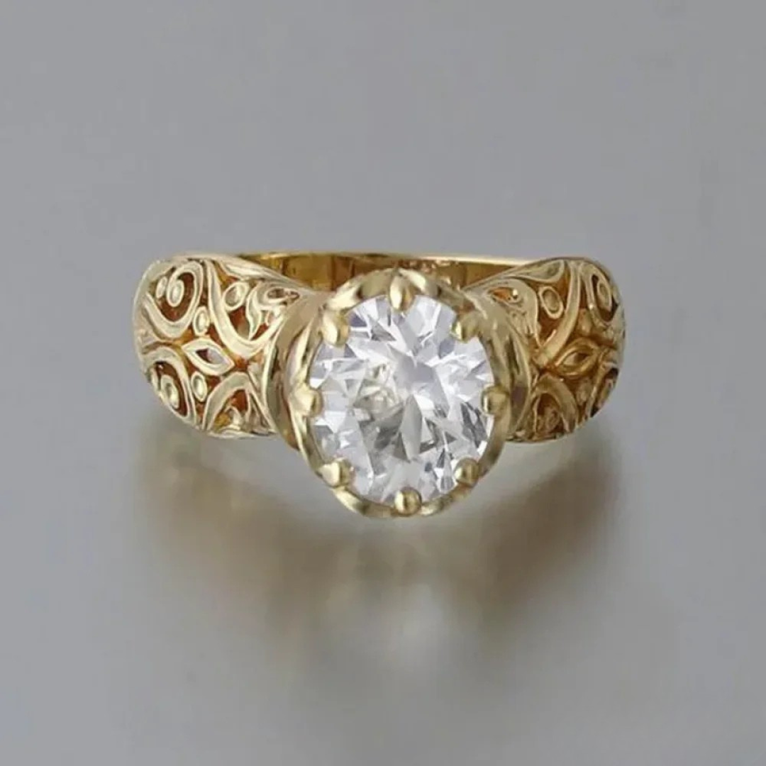 Elegant women's gold statement ring with sparkling white zirconia stones, a perfect fashion jewelry gift for her.