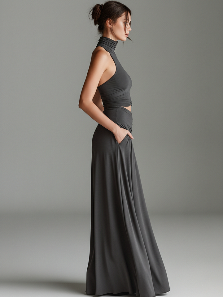 Fashionable gray turtleneck halter cutout maxi dress for women, suitable for formal or party wear.