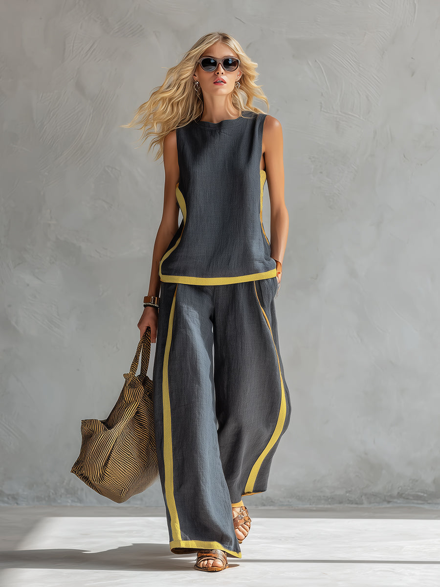 Chic women's gray vest and wide-leg pants matching set. Comfortable two-piece for everyday or office elegance.