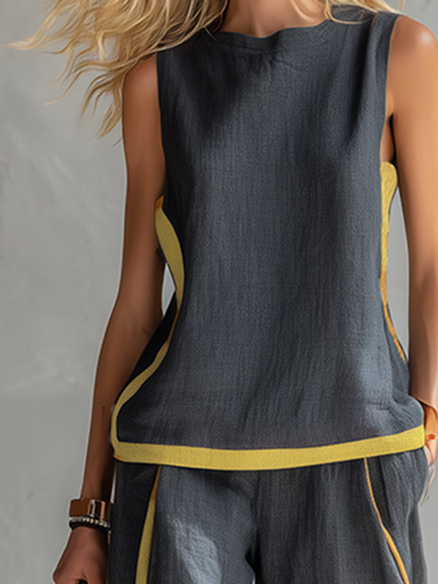 Gray women's loose fit vest and wide-leg pants set. Comfortable and elegant two-piece matching outfit for chic style.