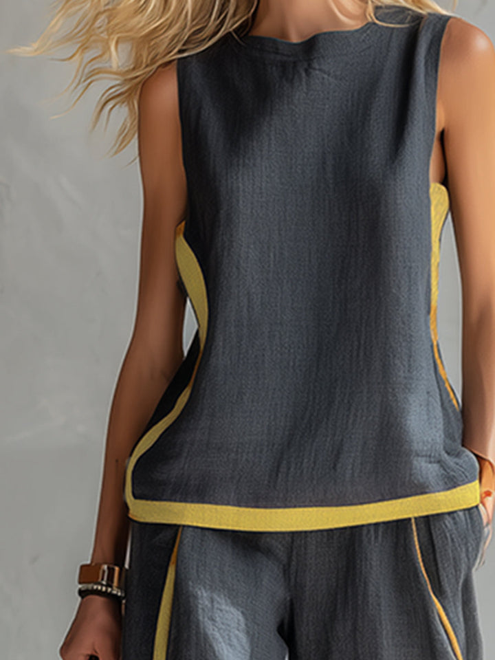 Gray women's loose fit vest and wide-leg pants set. Comfortable and elegant two-piece matching outfit for chic style.